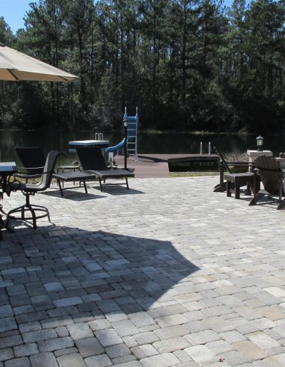 outdoor patio crated with pavers; large enough for patio furniture and a fire pit