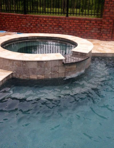 hot tub and pool deck created by Walker Footings